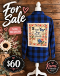 Size Medium blue and black plaid flannel with Find Joy in the Ordinary floral and butterfly back panel.