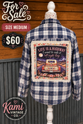 Blue and white plaid size Medium vintage flannel with a Life Is a Highway pickup truck back design