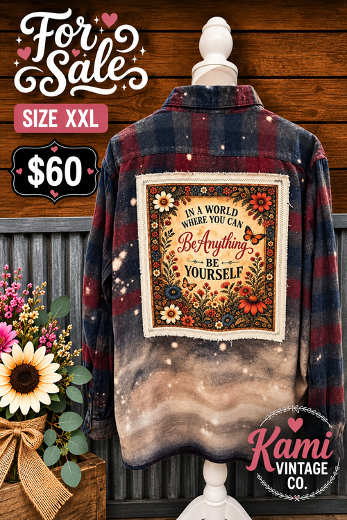 Size XXL navy and burgundy plaid upcycled flannel with a Be Yourself floral and butterfly back panel and faded tan lower section.